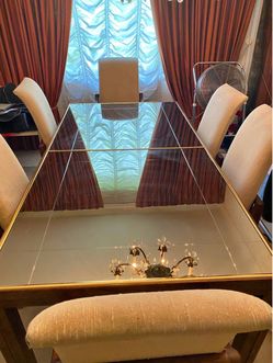 Henredon Mirror Top dining table with 6 chairs.