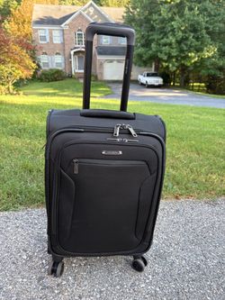 Carry on 21” spinner luggage. Excellent condition.