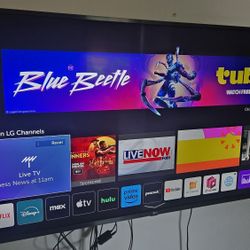 55" LG UHD TV w/ wall mount - 55UM7300AUE