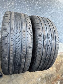 Set of 2 nice Continental CrossContact 275/45/22 ( We install & balance)
