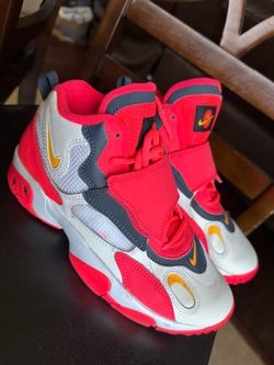 These are Nike Air Max Speed Turf sneakers in the 'Red Orbit'