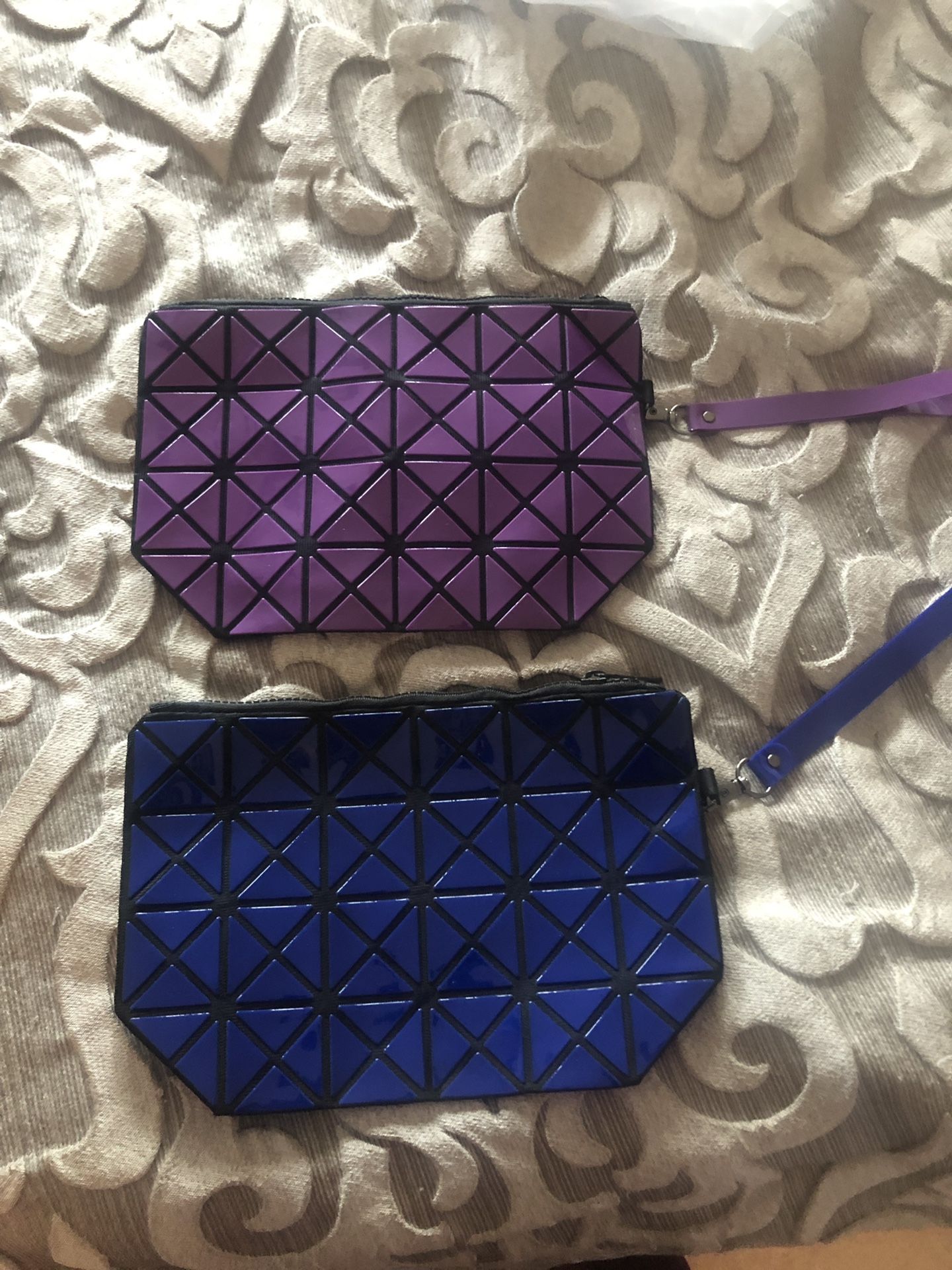 Multiple unique handbags!! Cosmetic case and wristlets!! Michaek Kors Coach!!!