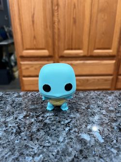 Funko pop Pokemon Squirtle Pop! Vinyl Figure.  Size approximately 3 inches tall.  Preowned no box.  Has been on display in a cabinet with a Funko pop 