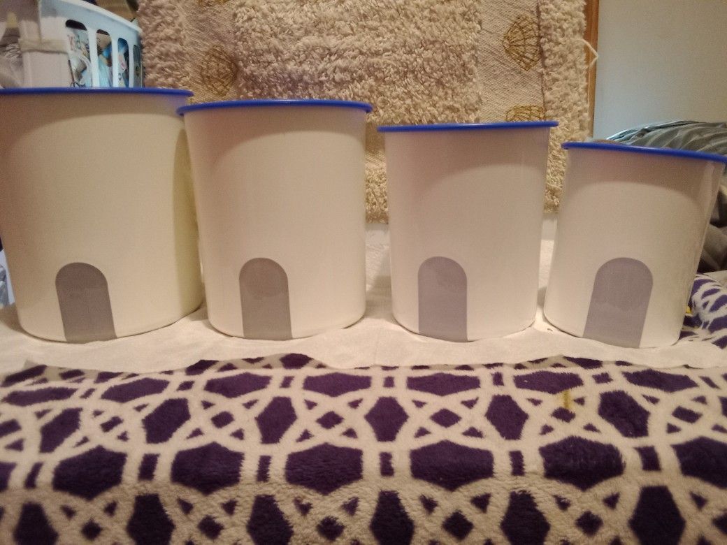 Set Of Four Tupperware Canisters 