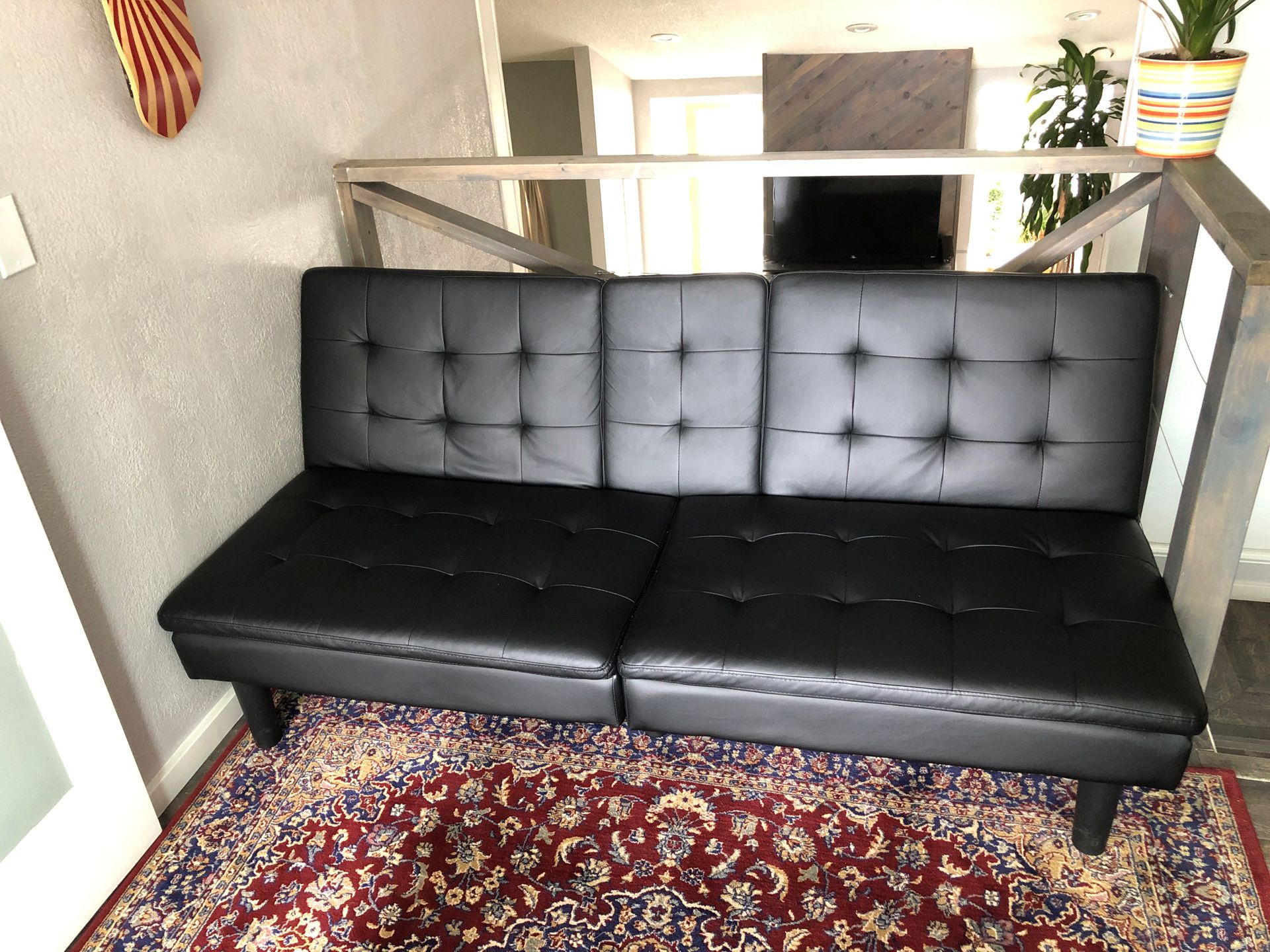 Mint black leather futon couch!