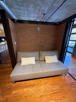 Convertible queen sofa by innovation living