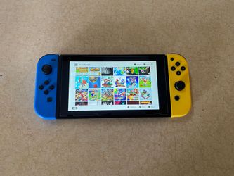 Nintendo Switch + 100 SWITCH Games Mario Kart,Mario Party,Gta,Minecraft,Zelda,Pokemon and Many More