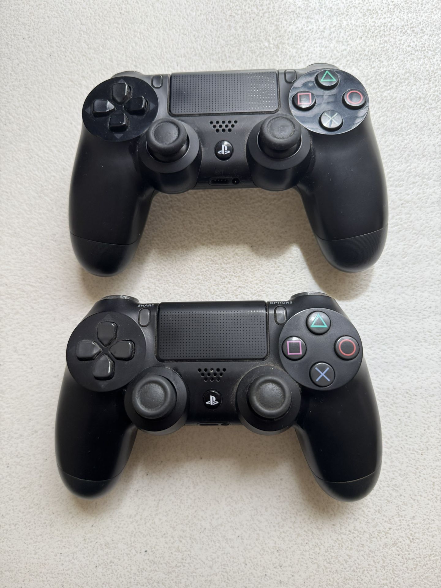 Two PlayStation 4 Controllers In Barely Used Condition