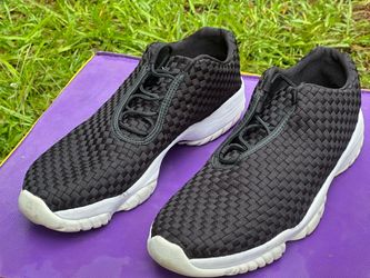 Size 12  Nike Air Jordan Future Low sneakers in black with a white midsole.