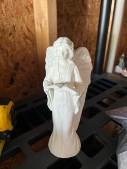 White Angel Figurine Holding Book