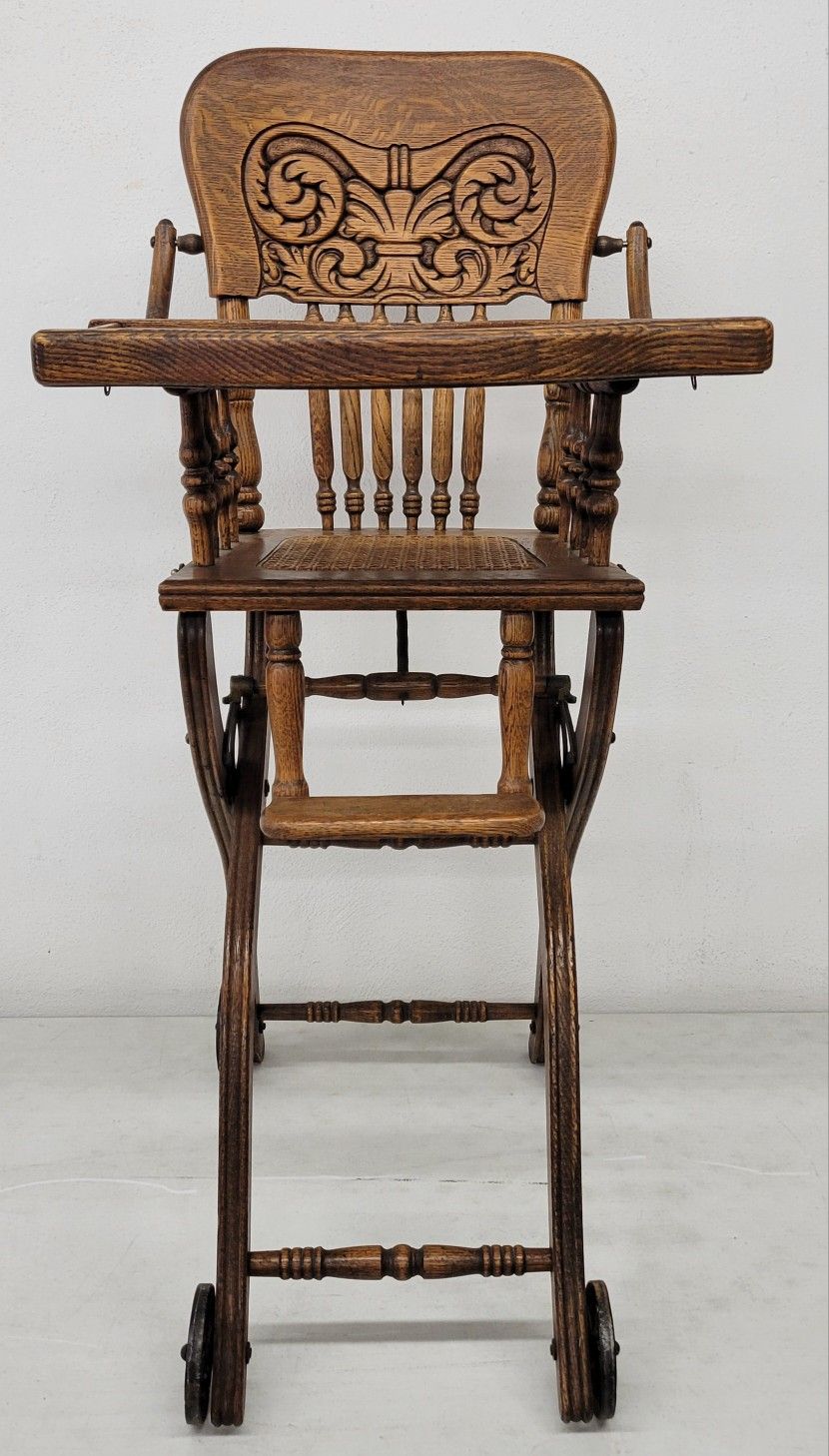 1930 Antique oak Convertible high low chair or stroller.
