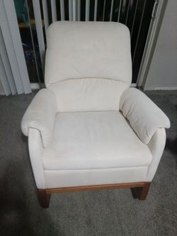 Ivory apolstered rocky chair