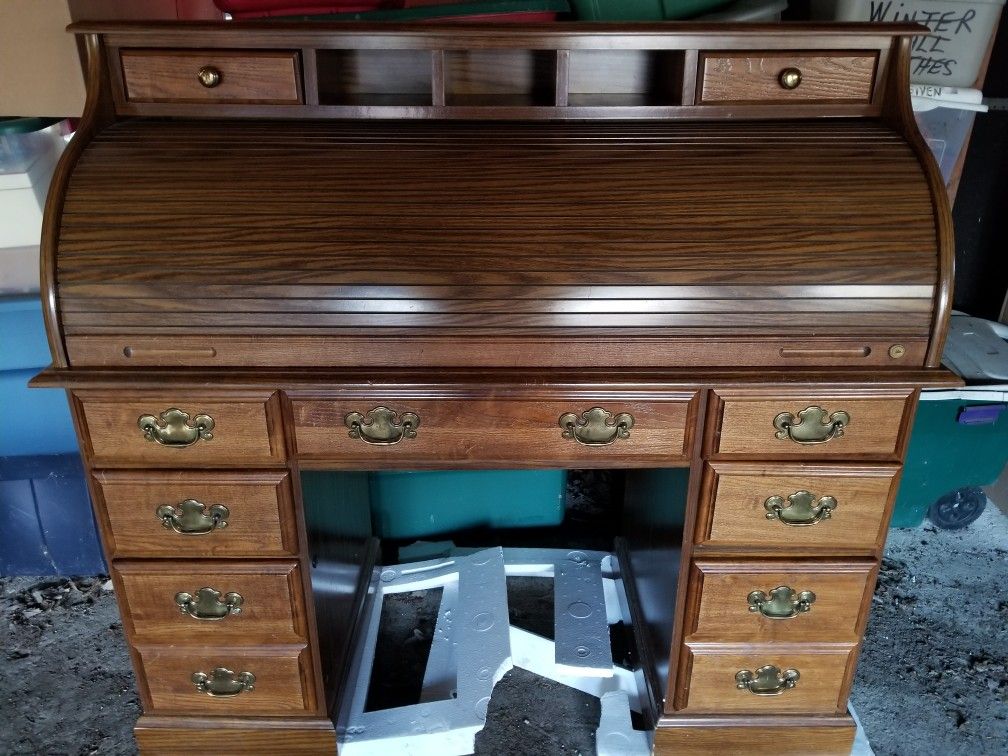 ROLL TOP DESK IN GREAT CONDITION COST $3,000. NEW, TAKE $395.