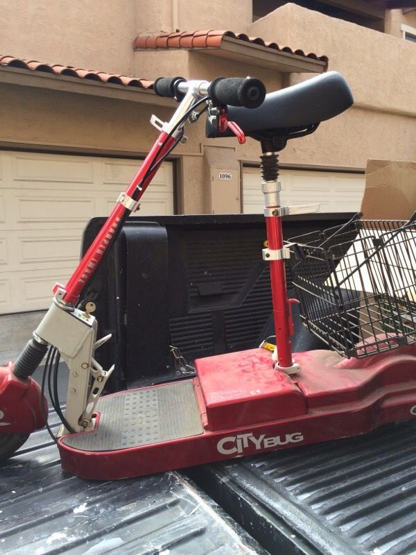 SHARPER IMAGE CITY BUG ELECTRIC SCOOTER