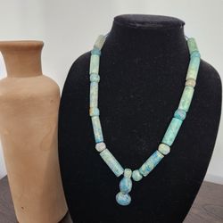 #2211,  https://offerup.com/redirect/?o=TUVUTVVTRVVNLk9SRw== INDIGENOUS AMERICAN (COSTA RICAN) 500 BCE-900 CE TURQUOISE CILYN
