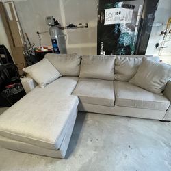 Living Spaces Grey Sofa