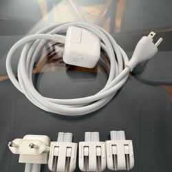 Apple power adapter with an extension cable and a set of international plug adapters