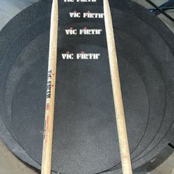 Drum Pads , Sticks Included.