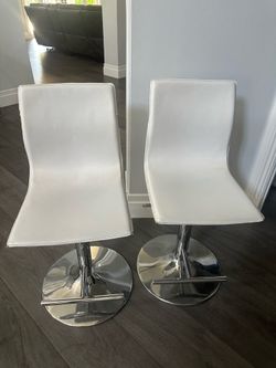 2 white barstools silver base adjustable