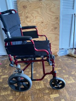 Light weight wheel Chair. Maroon color This is special order.  Easy to transport.