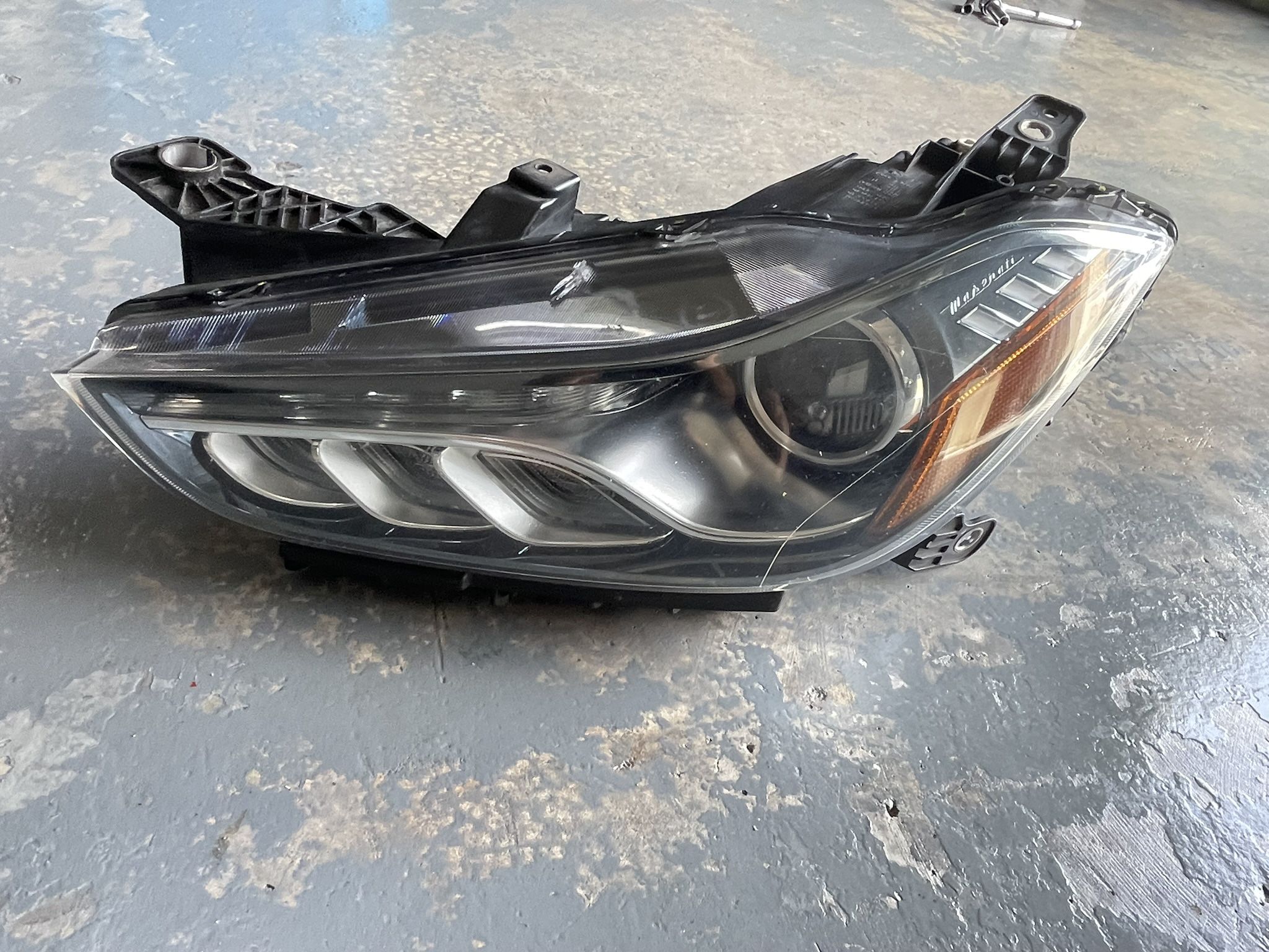 2014 to 2019. Maserati Ghibli Headlight Driver Side