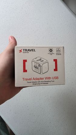 Travel adapter with USB.
Travel adapter with auto-resetting fuse 
Single pug not allowed. Adaptador de viaje con USB
Ver imágenes para mas especificac