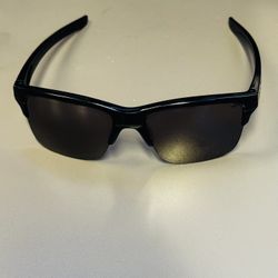 Oakley Thinlink Sunglasses OO9316-03 Black Ink / Sapphire Iridium Product Overview The Oakley Thinlink is a sophisticated, semi-rimless sunglass that 