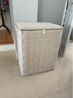 Extra large handwoven beige fabric laundry hamper with a lid and sturdy side handles