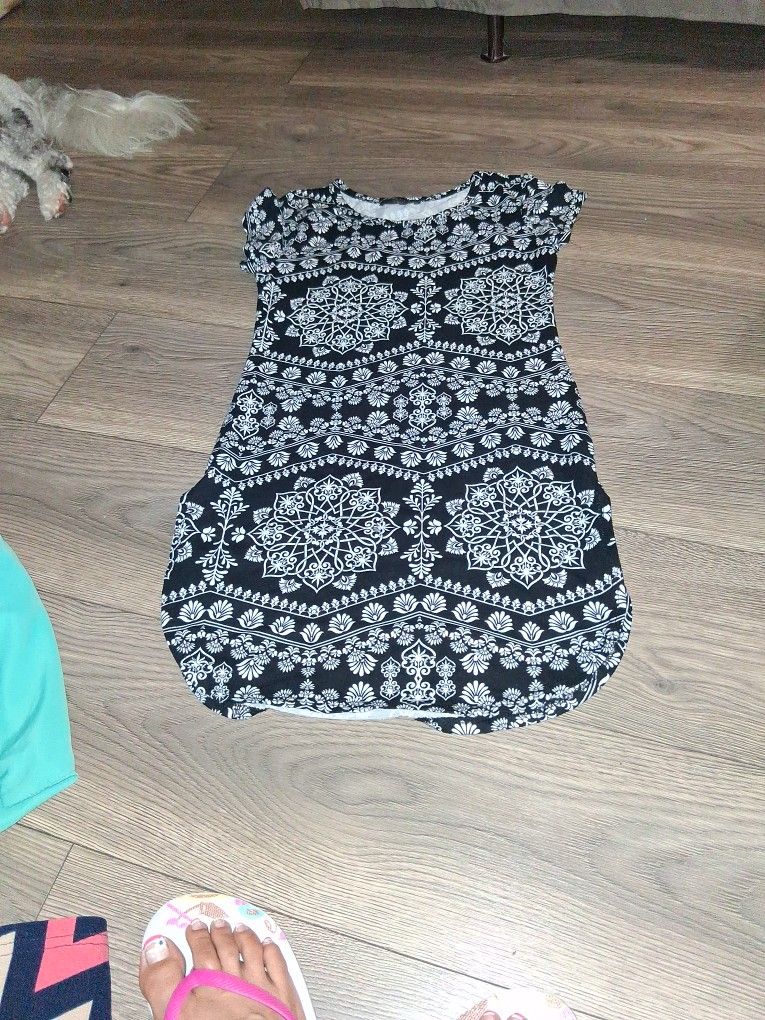 Size Small Abierto Alos Lados.