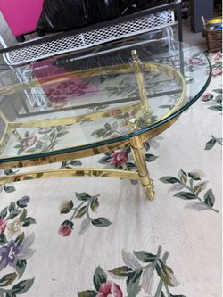 Glass and brass coffee table
