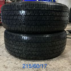 Two - 215/60/17 Firestone Champion Fuel Fighter Tires