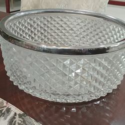 Antique detailed glass bowl with sterling silver rim. Excellent condition!