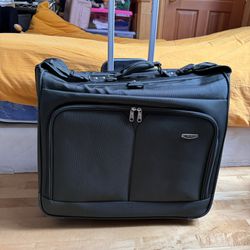 DELSEY Nylon Rolling Suitcase