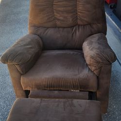 Two identical recliner chairs