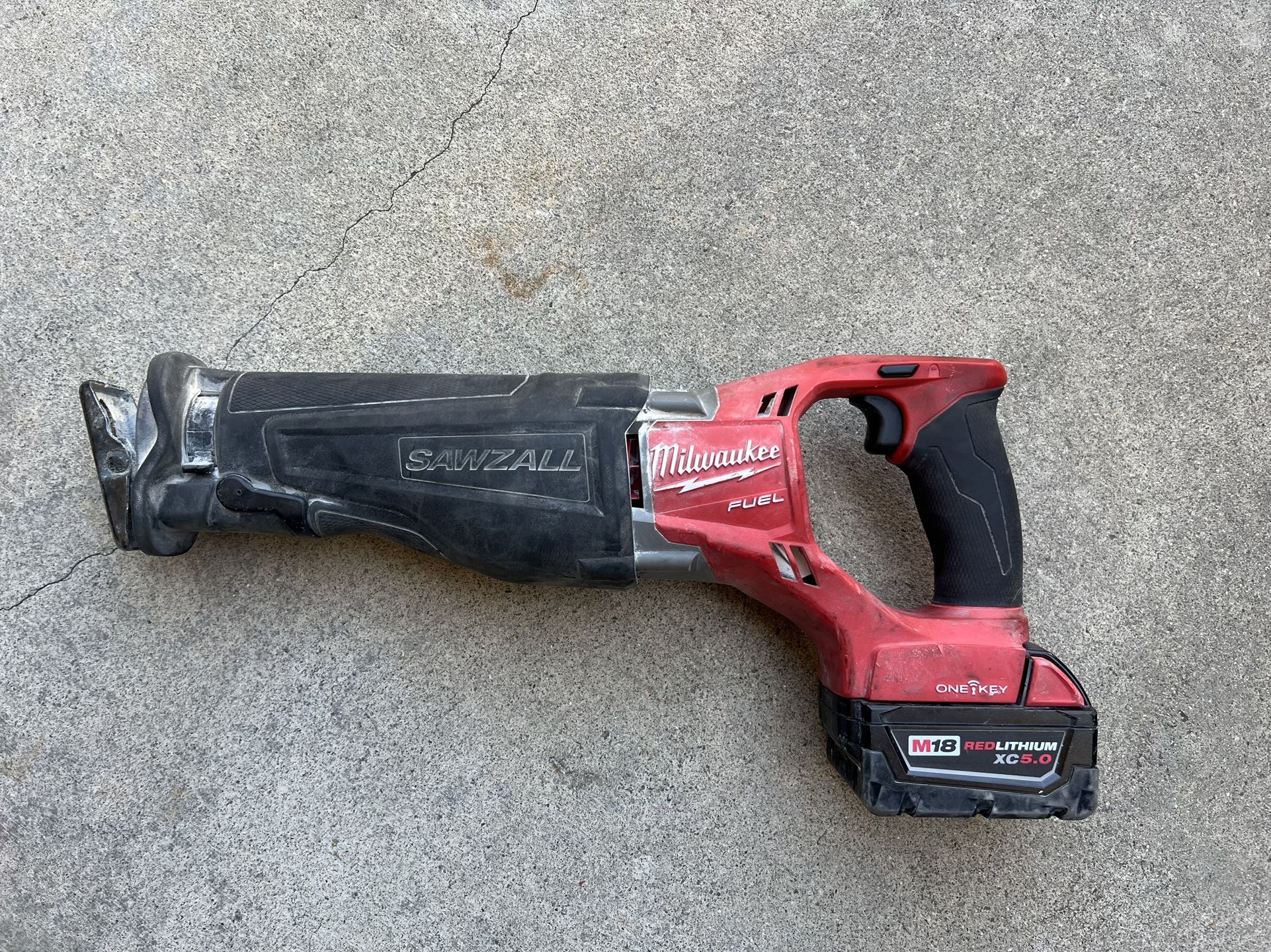 Fuel Milwaukee Sawzall with battery as shown