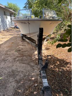 Boat trailer for sale.  16-18’.    Needs tires only