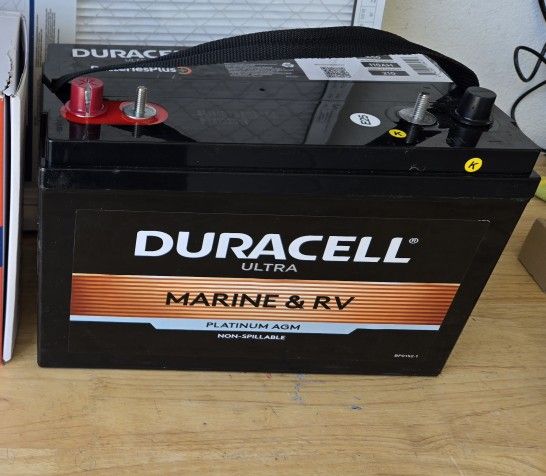 DURACELL 110 AGM BATTERY AND 10 VOLT X 2 BATTERY CHARGER