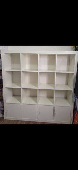 Shelf with 4 storage in great condition