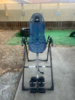 Teeter inversion table for back pain