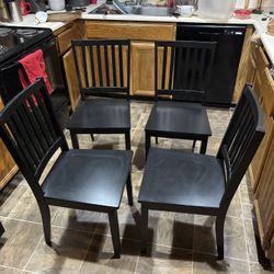 Set of 4 Black Dining Chairs – Sturdy & Lightly Used