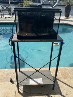 Small Glass Aquarium on Black Metal Stand with Shelf