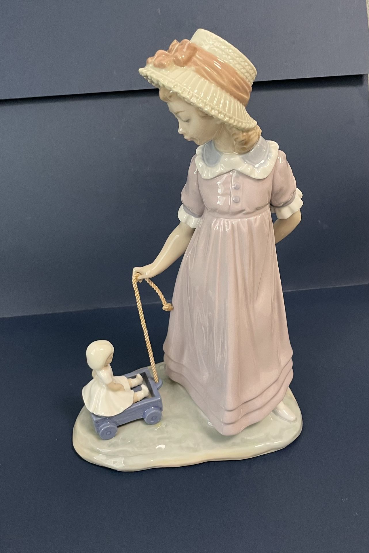 Lladro Porcelain Girl With Toy Cart And Doll