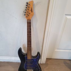 Guitarra Eléctrica. 