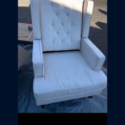  a beige fabric rocker chair   Great condition