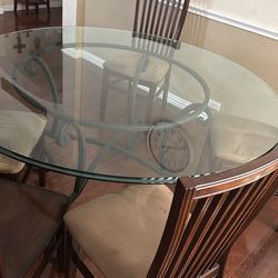 Glass table with iron base
