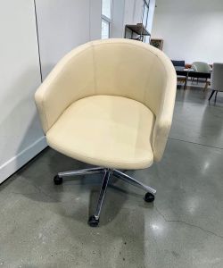 OFS Cinque Low-Back Swivel Chair – Cream Vinyl & Aluminum | $800