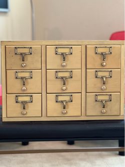 Small antique library card catalog