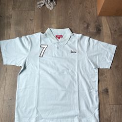 Supreme ‘World Famous’ 7 Polo by Supreme
