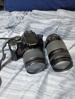 Canon EOS DSLR Camera with Two Lenses
