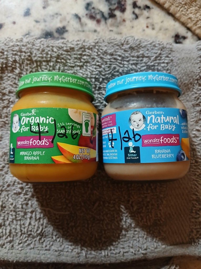 Big And Small Jars Of Baby Food 